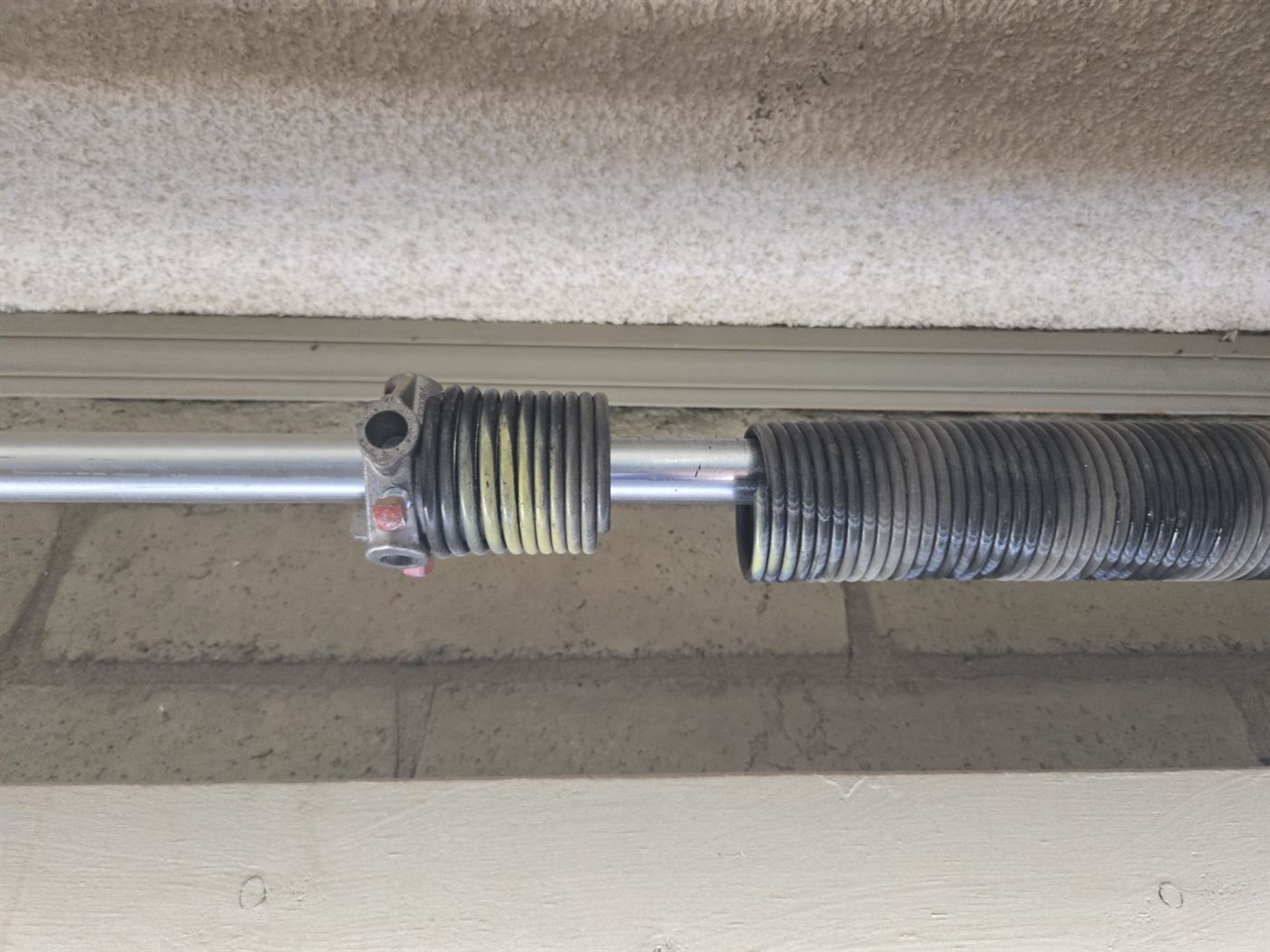 New high-cycle torsion springs installed on a garage door in Phoenix
