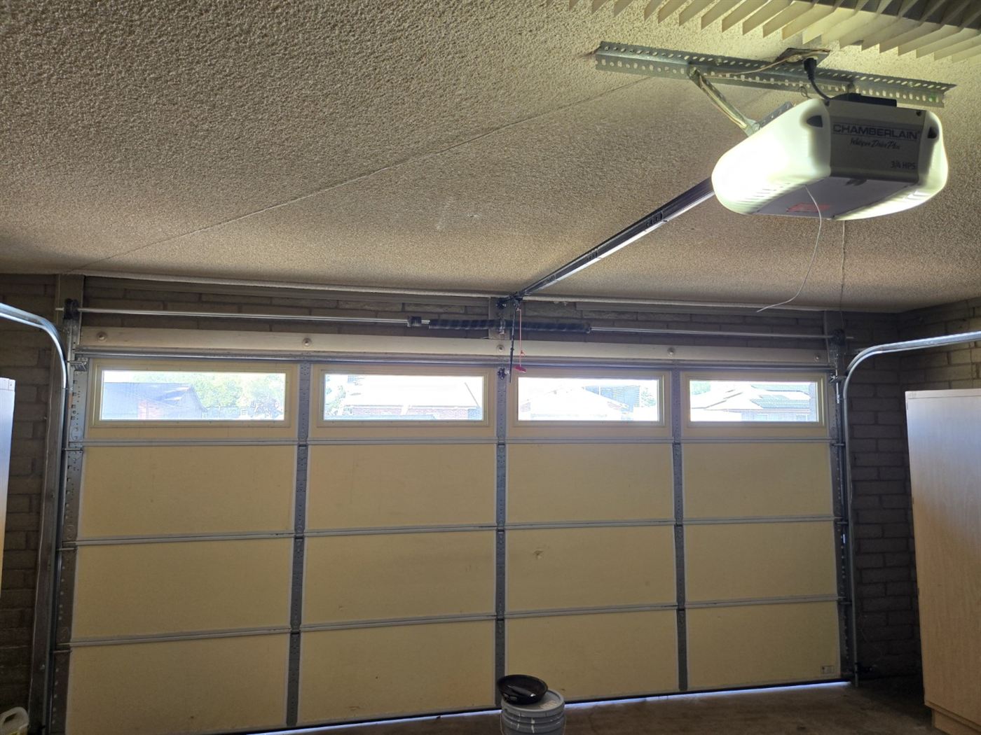 Inside view of a new insulated garage door with LiftMaster opener